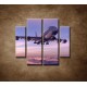 Obrazy na stenu - Lietadlo v oblakoch - 4dielny 100x90cm